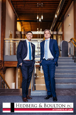 Two attorneys at Hedberg & Boulton law office